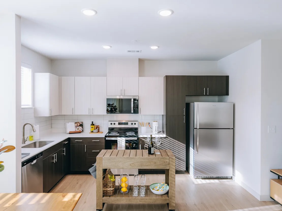 White Quartz Countertops and Stainless Steel Appliances