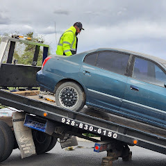 Stuck on the side of the road? Call for a tow!