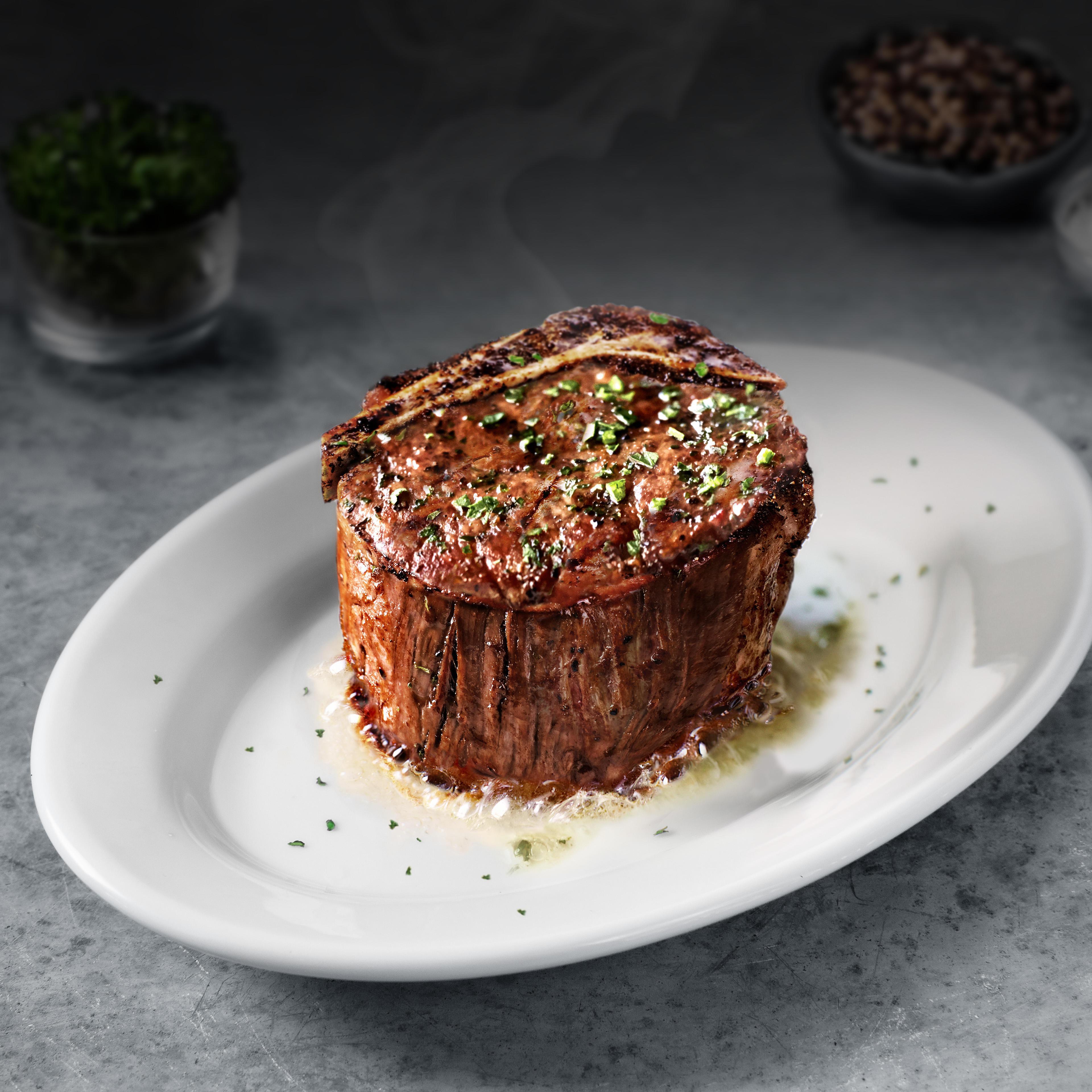 BONE-IN FILET* - incredibly tender 16 oz bone-in cut, aged to the peak of flavor Ruth's Chris Steak House Fort Lauderdale (954)565-2338