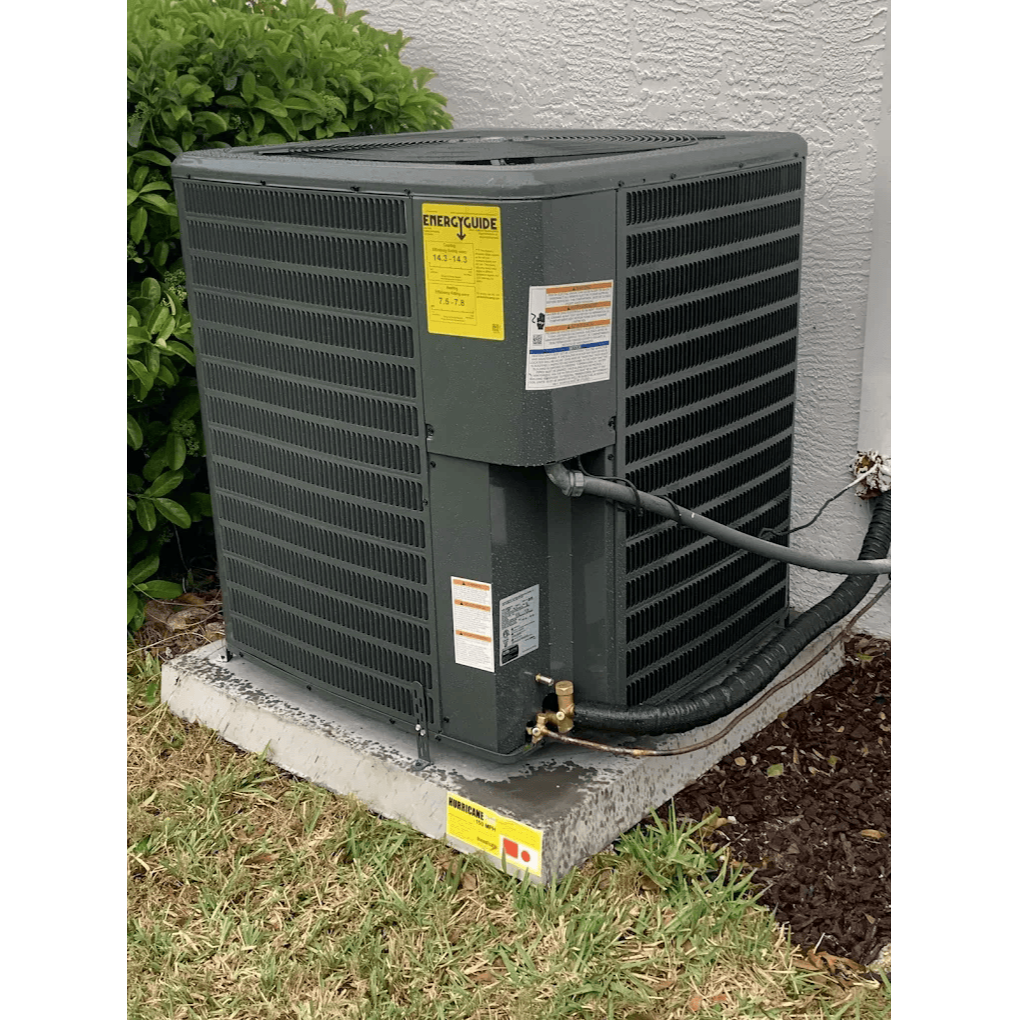 Outdoor air conditioning unit installed at residential home by Gotcha Heating and Air Inc in Spring Hill Florida