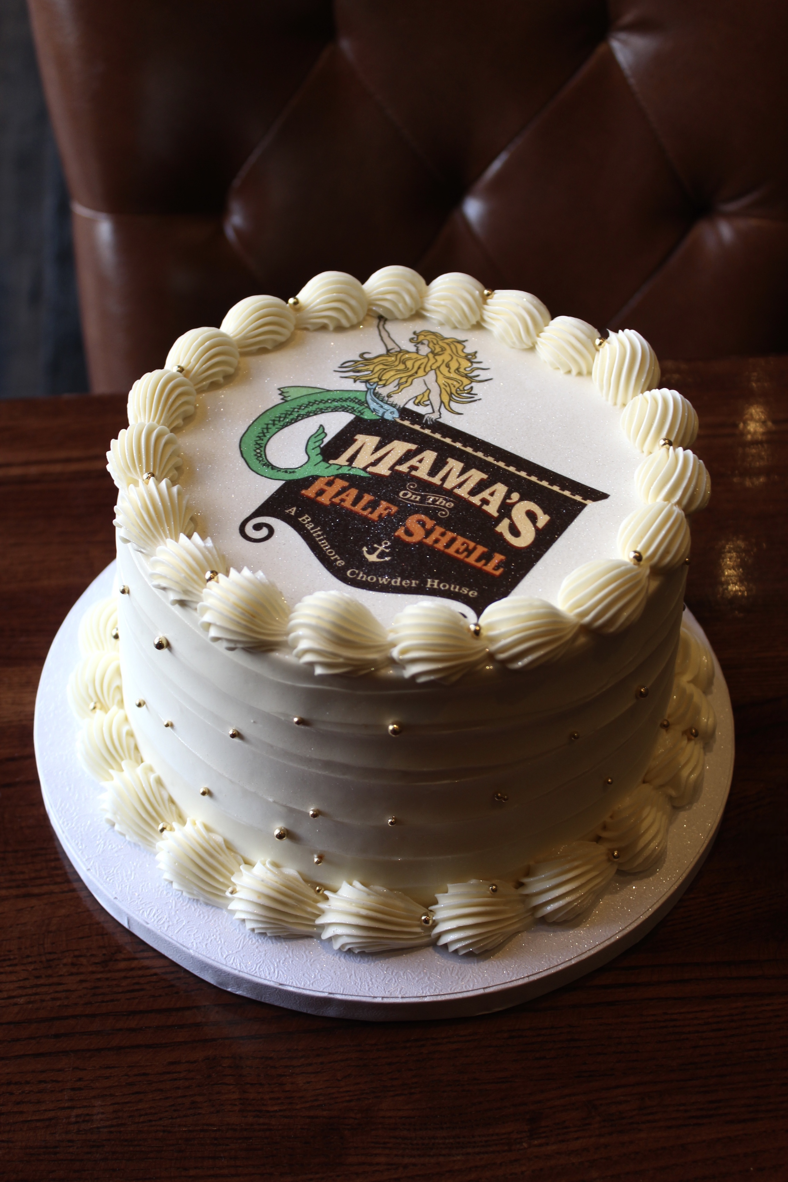 A custom cake with Mama's On The Half Shell logo. 