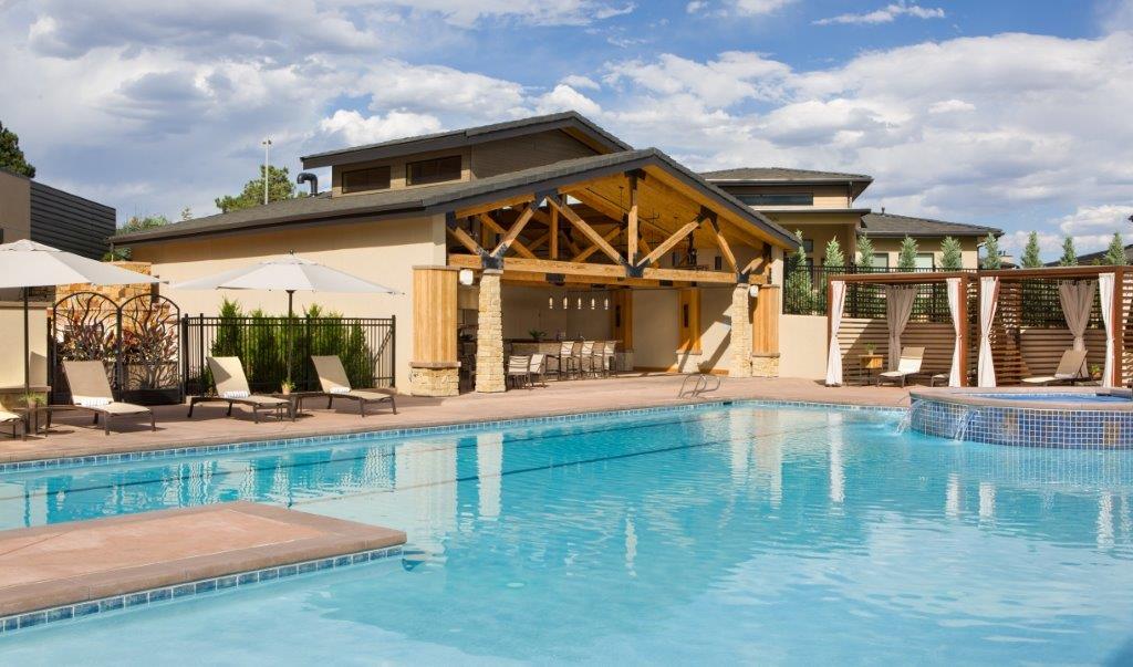 Commercial hospitality renovation completed by Reliant Construction in Colorado Springs, featuring lodge-style interior and custom wood and stone finishes.