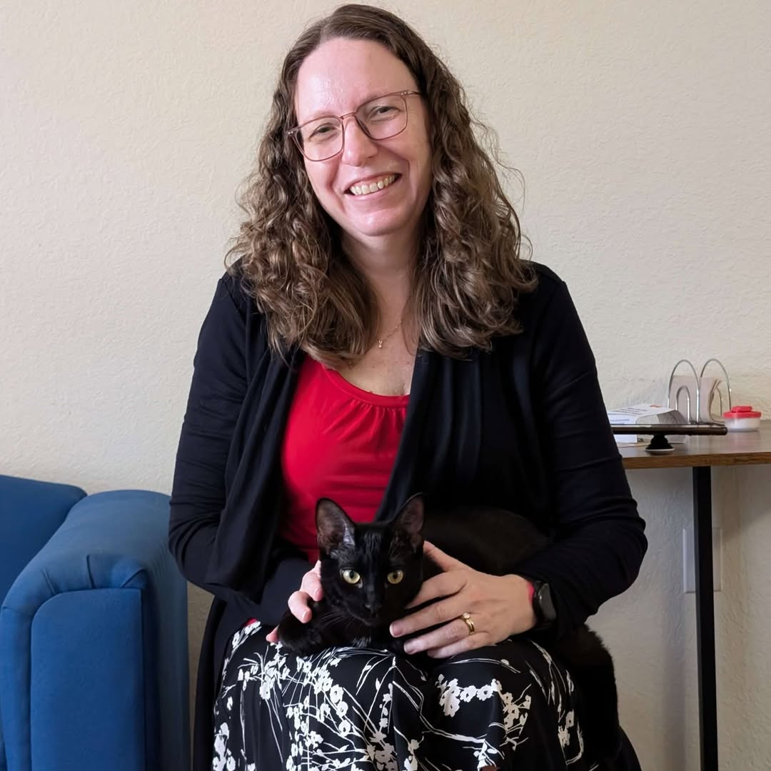 Help us (and kitten Toothless) wish Christine a happy birthday! 