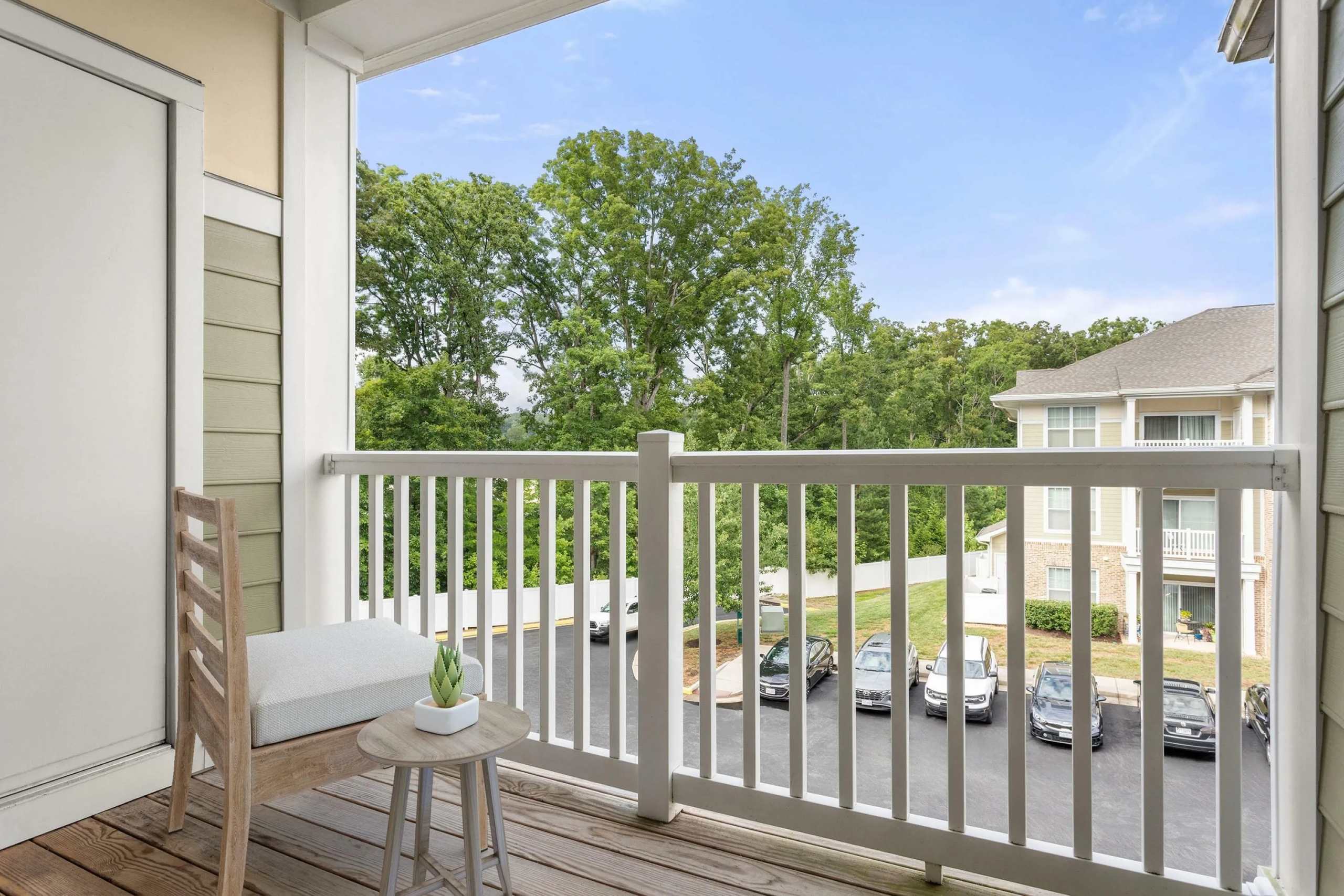 Balcony with seating and tree views