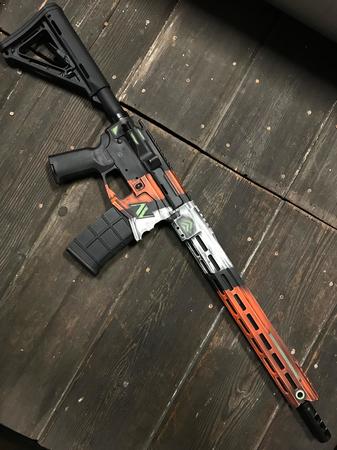 Images Armory Valentine, LLC Cerakote Coating, Laser Engraving & Custom Holsters