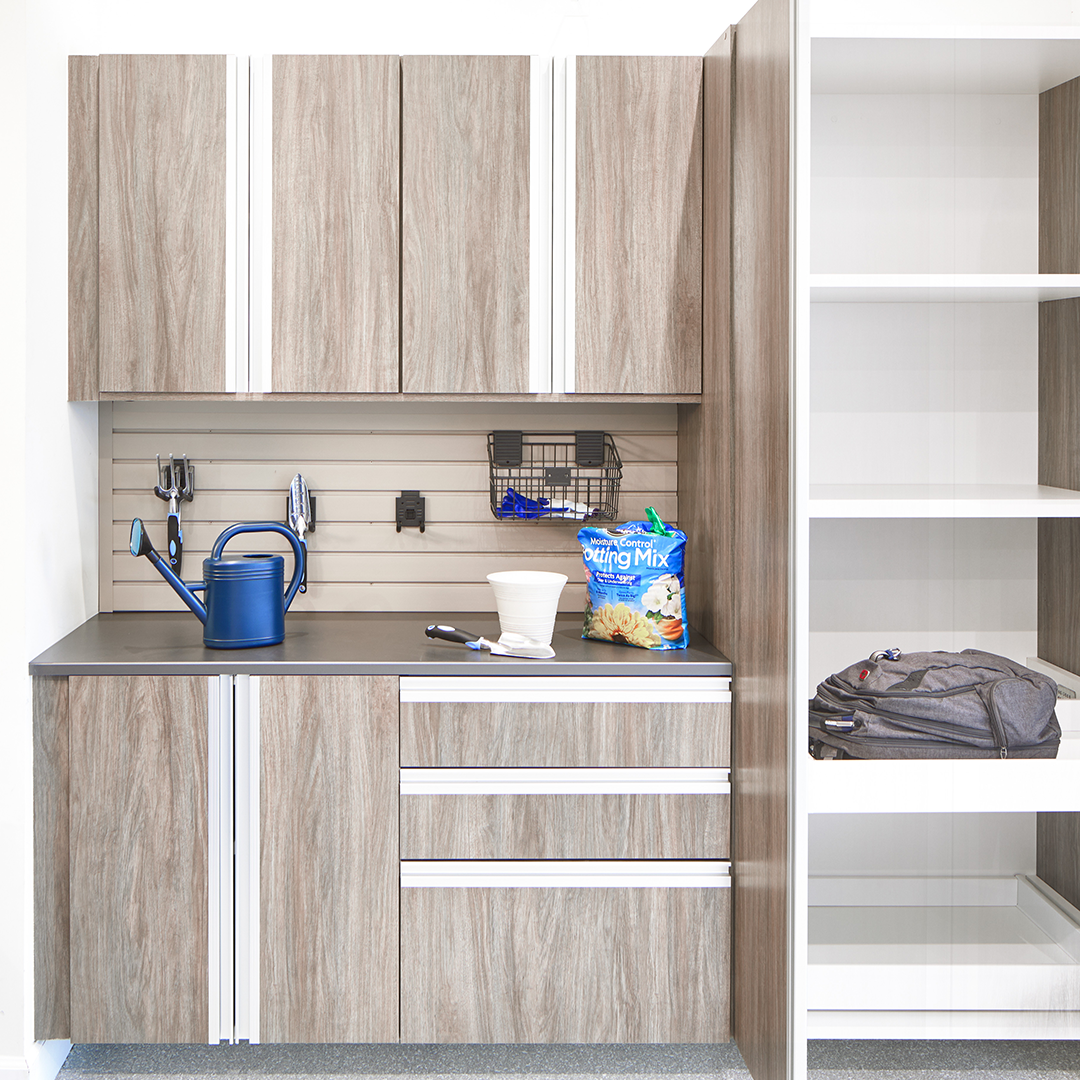 There’s no reason to cringe when you enter your garage! Our custom-designed and installed garage cabinets, overhead storage and wall systems will ensure there’s a place for everything so that you can keep everything in its place. Our heavy-duty cabinet systems are state of the art in design and styl