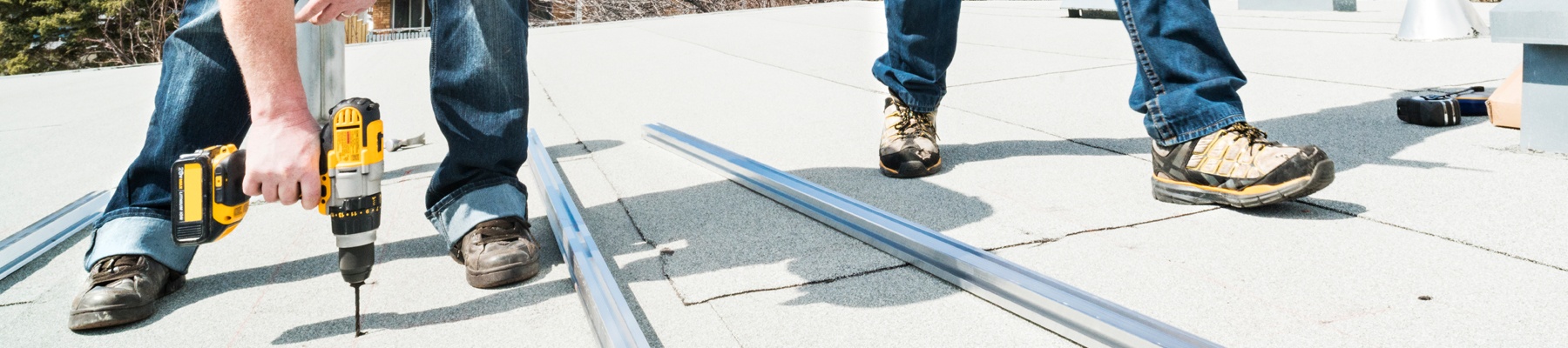 Most commercial buildings have flat and low-slope roofing systems to minimize energy costs and maximize space for HVAC units. The installation of these roofing systems can be complicated and require specialized contractors.