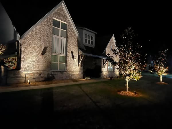 Home with exterior lighting