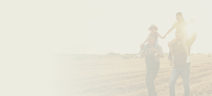 A father and son with their kids and grandkids on their shoulders.