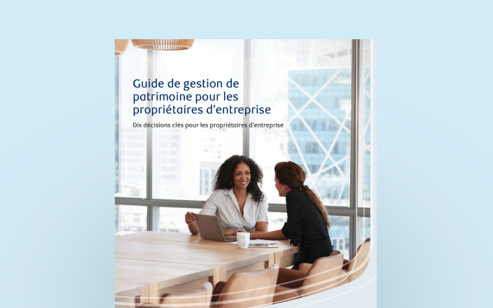 Couverture du Guide pour propriétaire d’entreprise avec deux professionnels à une table de conférence.