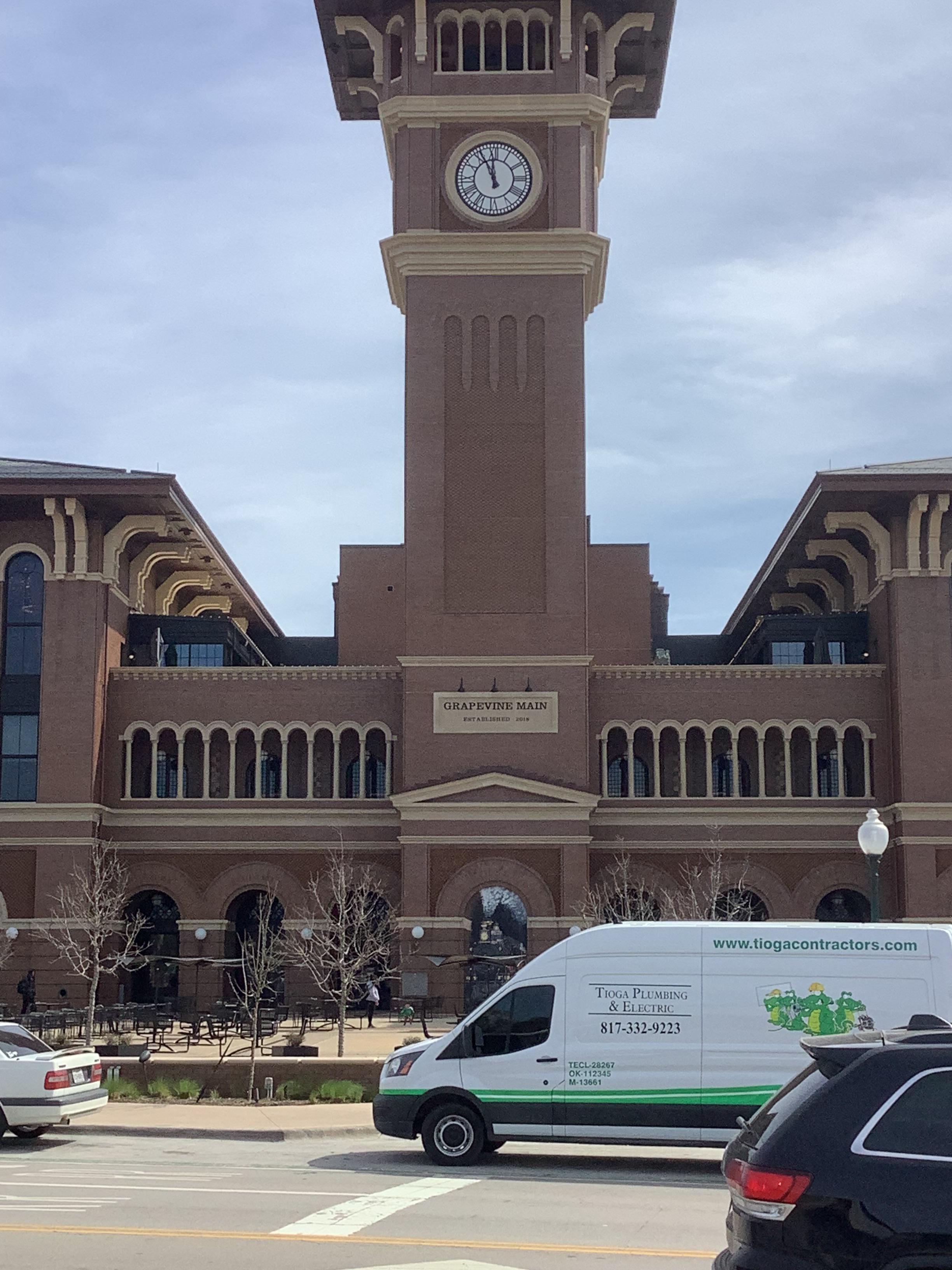 A Tioga Plumbing & Electric service van at Grapevine Main in Grapevine Texas.