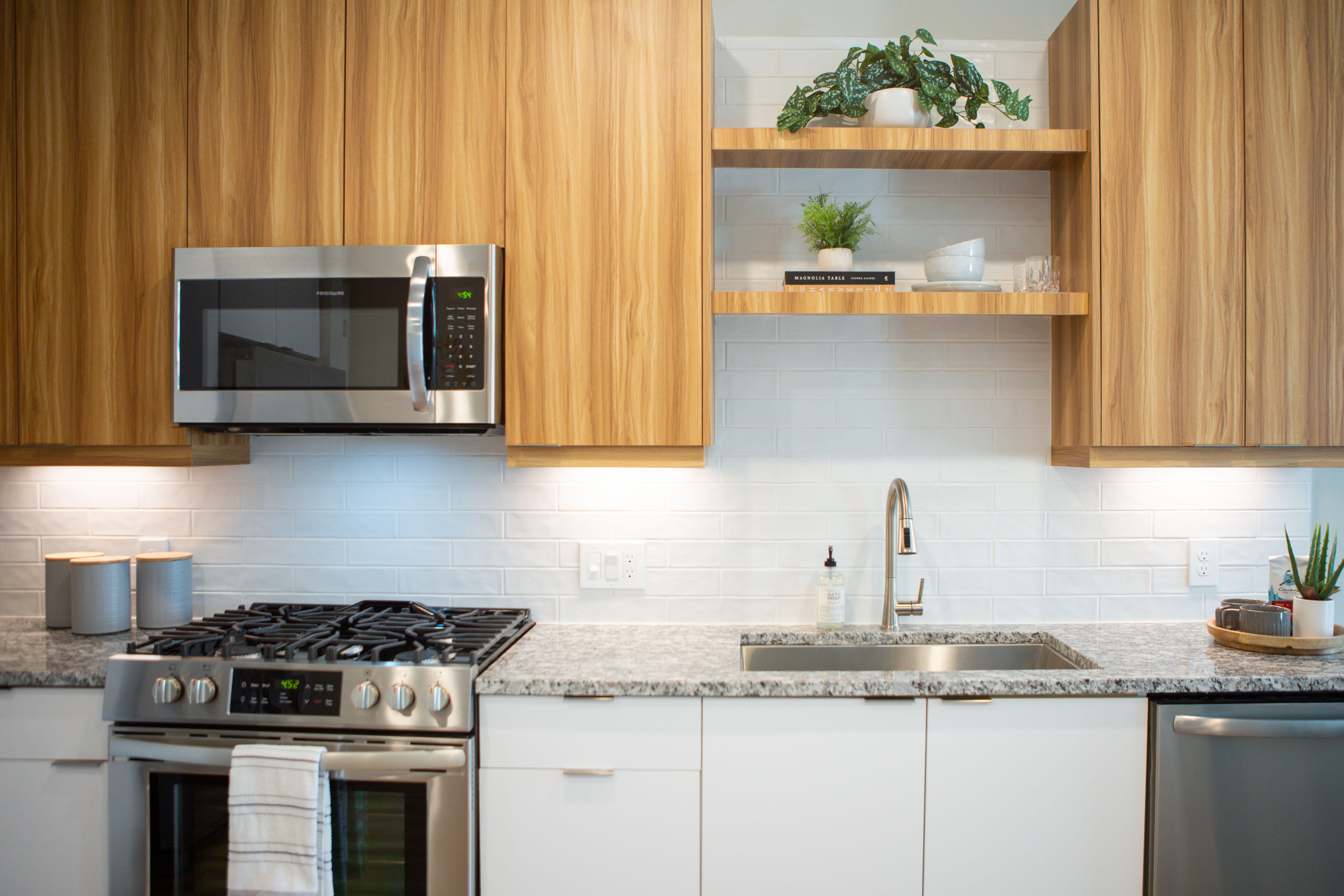 Kitchens featuring modern backsplash.