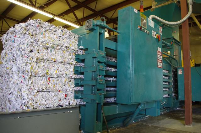 Absolute Data Shredding's shredded paper baling machine. We provide NAID AAA Certified paper shredding, hard drive destruction, and electronics recycling services in Oklahoma City and Tulsa, OK.