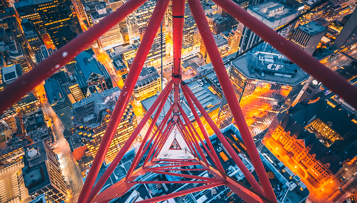 View of a dense city through a crane.