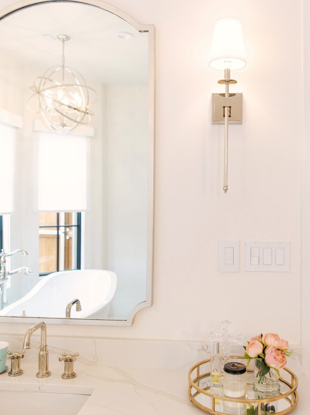 Mirror, Mirror on the wall, who has the best window treatments of them all? Budget Blinds of Rockwall, Terrell, Forney, and Greenville does! Our roller shades are the perfect touch for your bathroom.