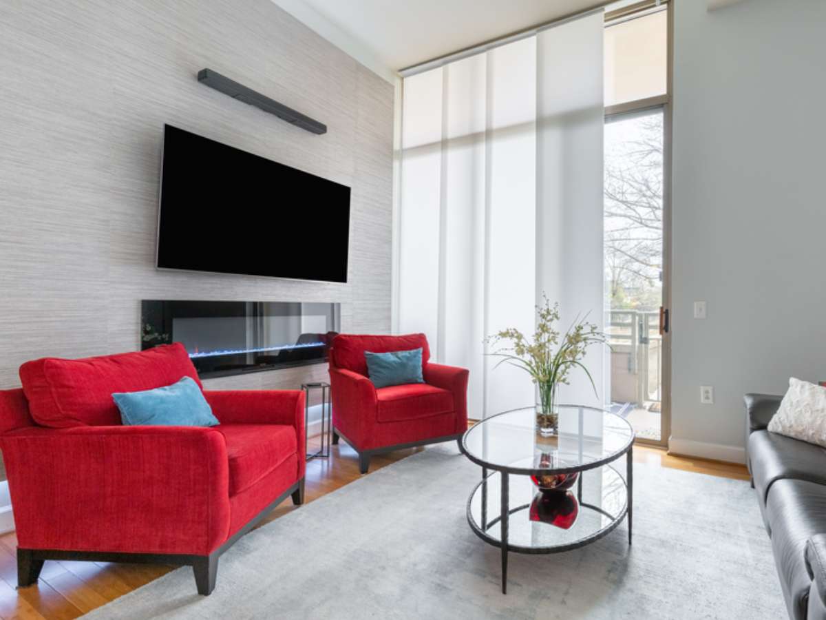 Panel track shades offer a sleek, modern look while providing privacy and soft, diffused light.