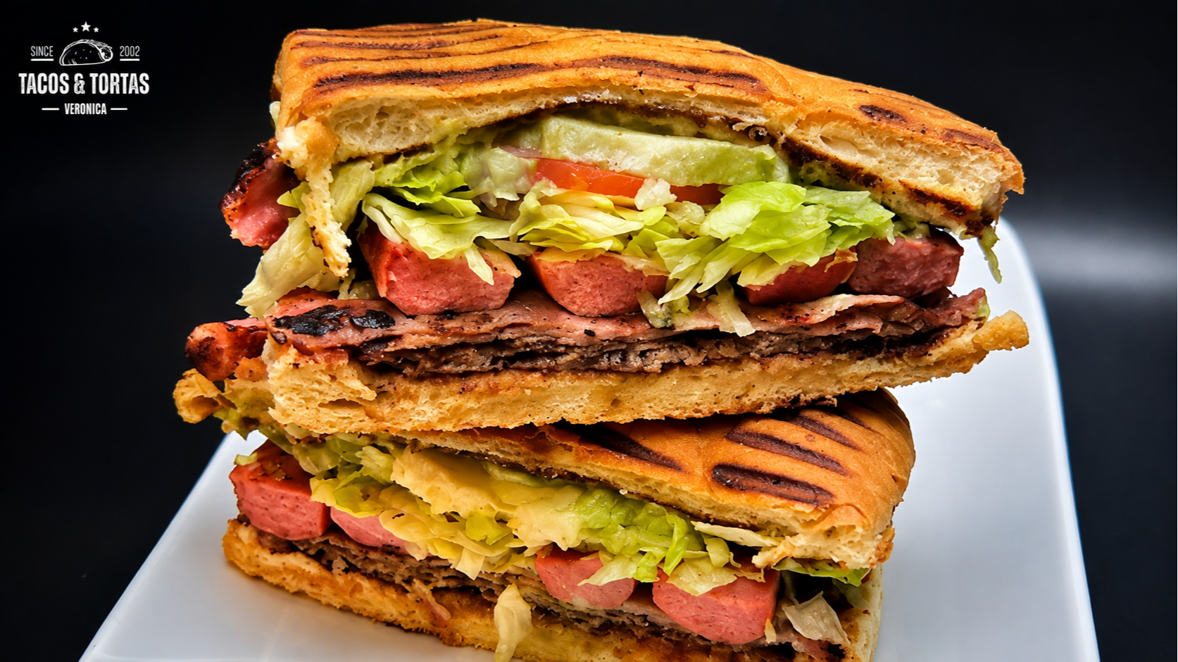 TORTAS
Is a type of sandwich that is made with a soft and white bread roll
filled with a variety of  