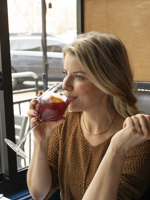 Guest enjoying a glass of wine
