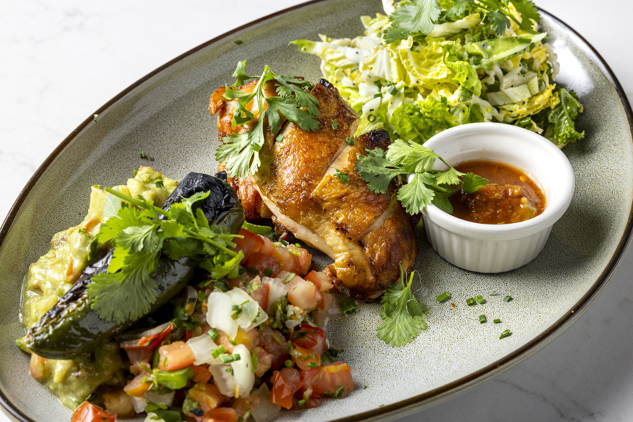 Grilled chicken taco platter with fresh toppings, house-made salsas, and bold coastal flavors in every bite