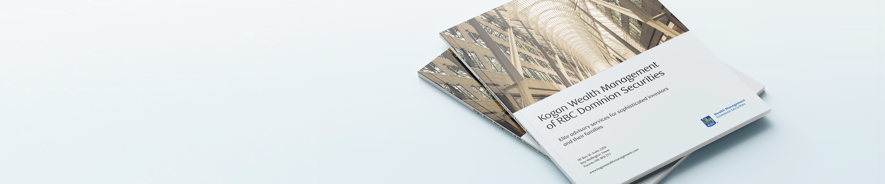 A Kogan Wealth Management branded folder.