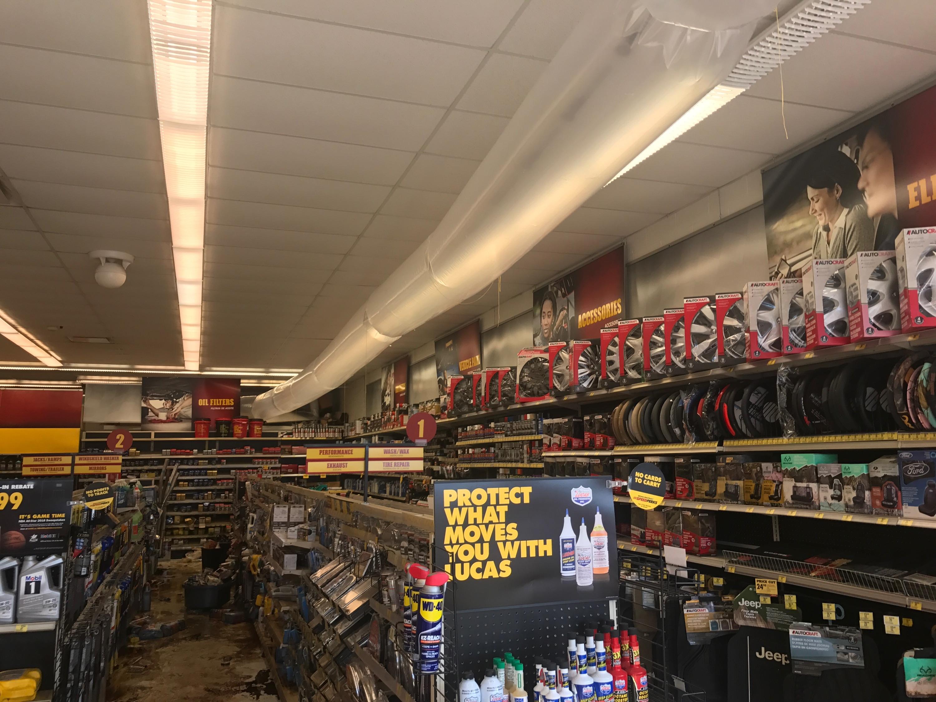 This Advance Auto Parts store flooded by Hurricane Harvey has water covering the floor.