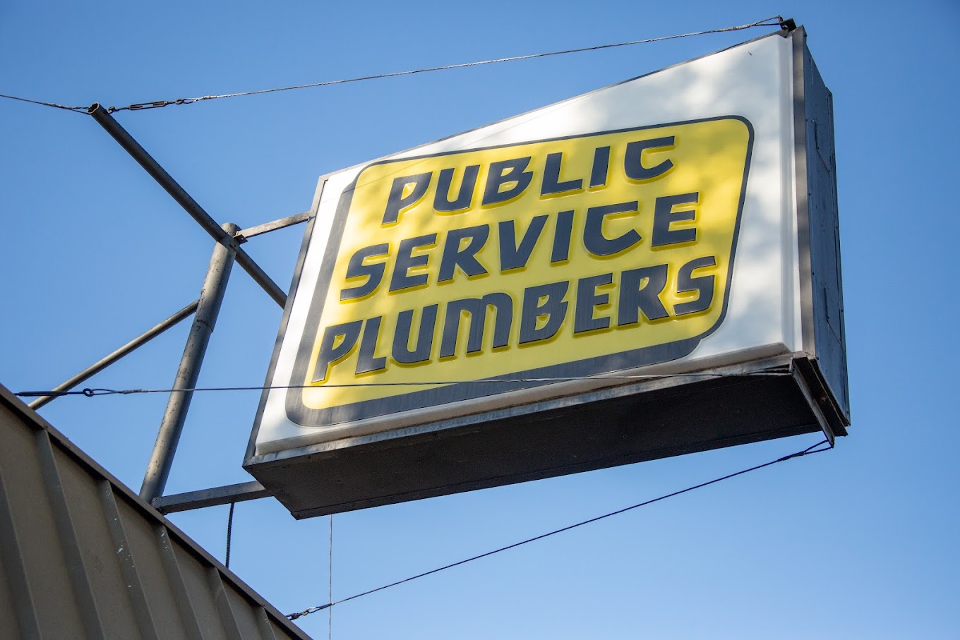 public service plumbers sign