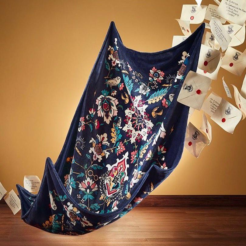 We don't know what's better... an invisible cloak or our Plush Throw Blankets in Home to Hogwarts