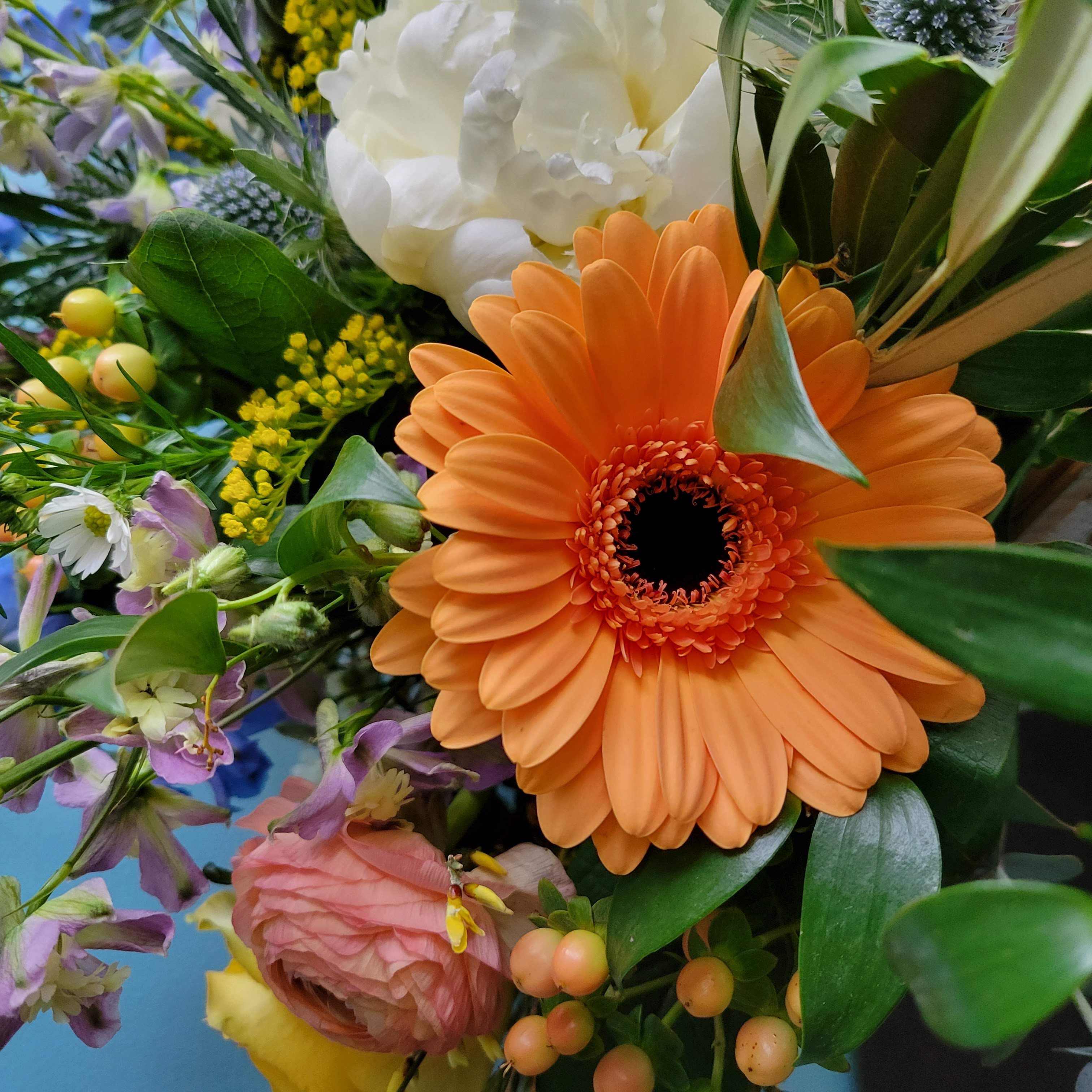 Gerbera daisies, ranunculus, and peonies