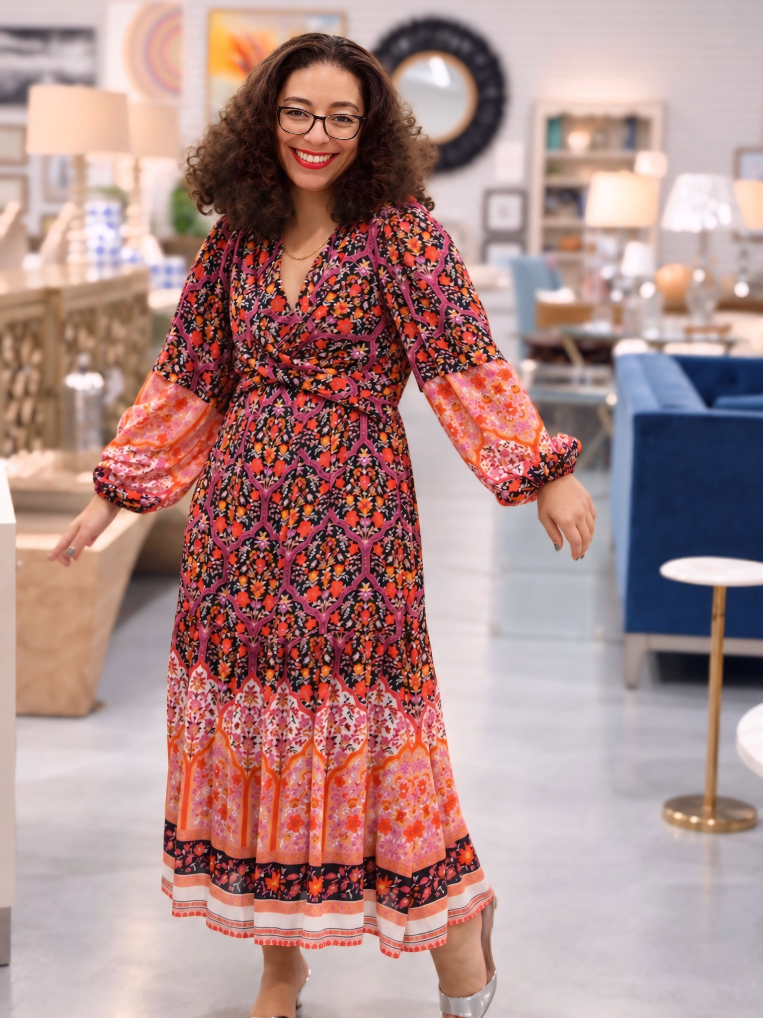 A flowing floral maxi dress brings colors and movement to True Fashionistas Designer Resale. Celebrate National Consignment Day with beautiful secondhand styles and discover your next favorite outfit.