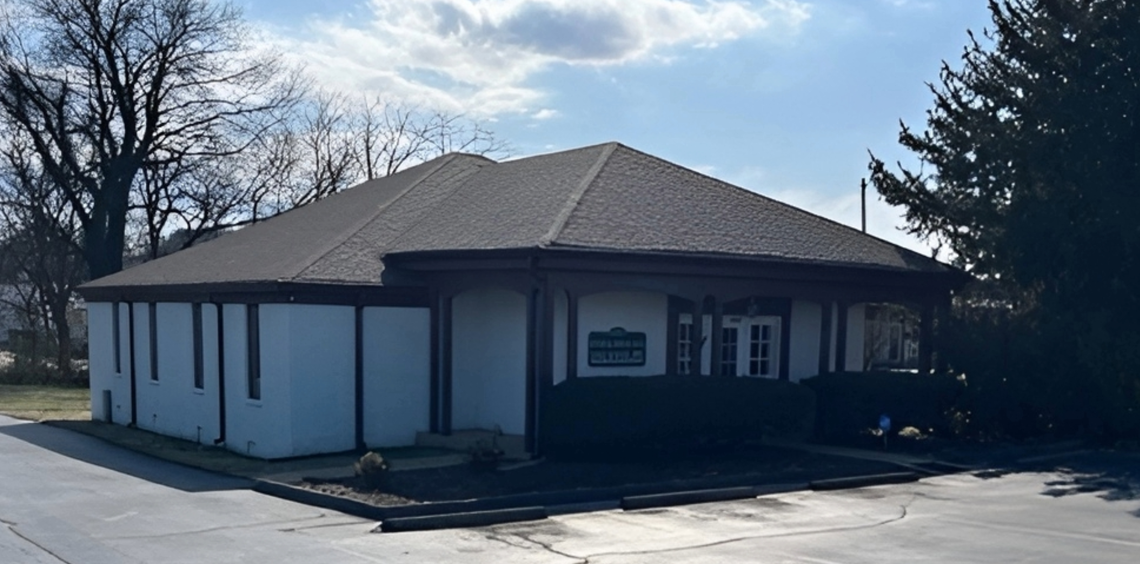 Exterior view of Hill Family Dental Columbia office building in Columbia, showcasing the welcoming dental practice entrance.