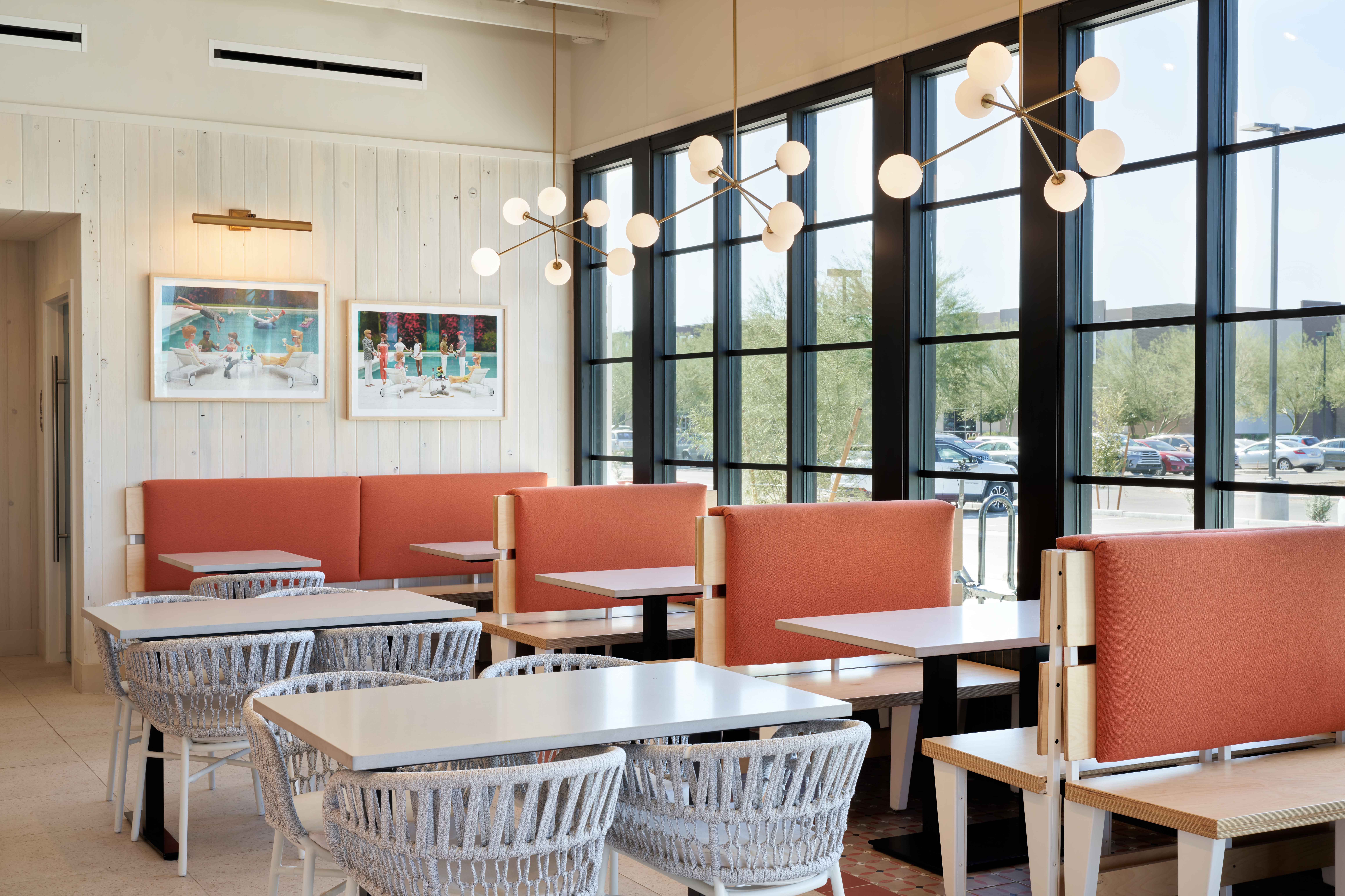 Interior of Birdcall SanTan Village with a wall of booths and seating options.