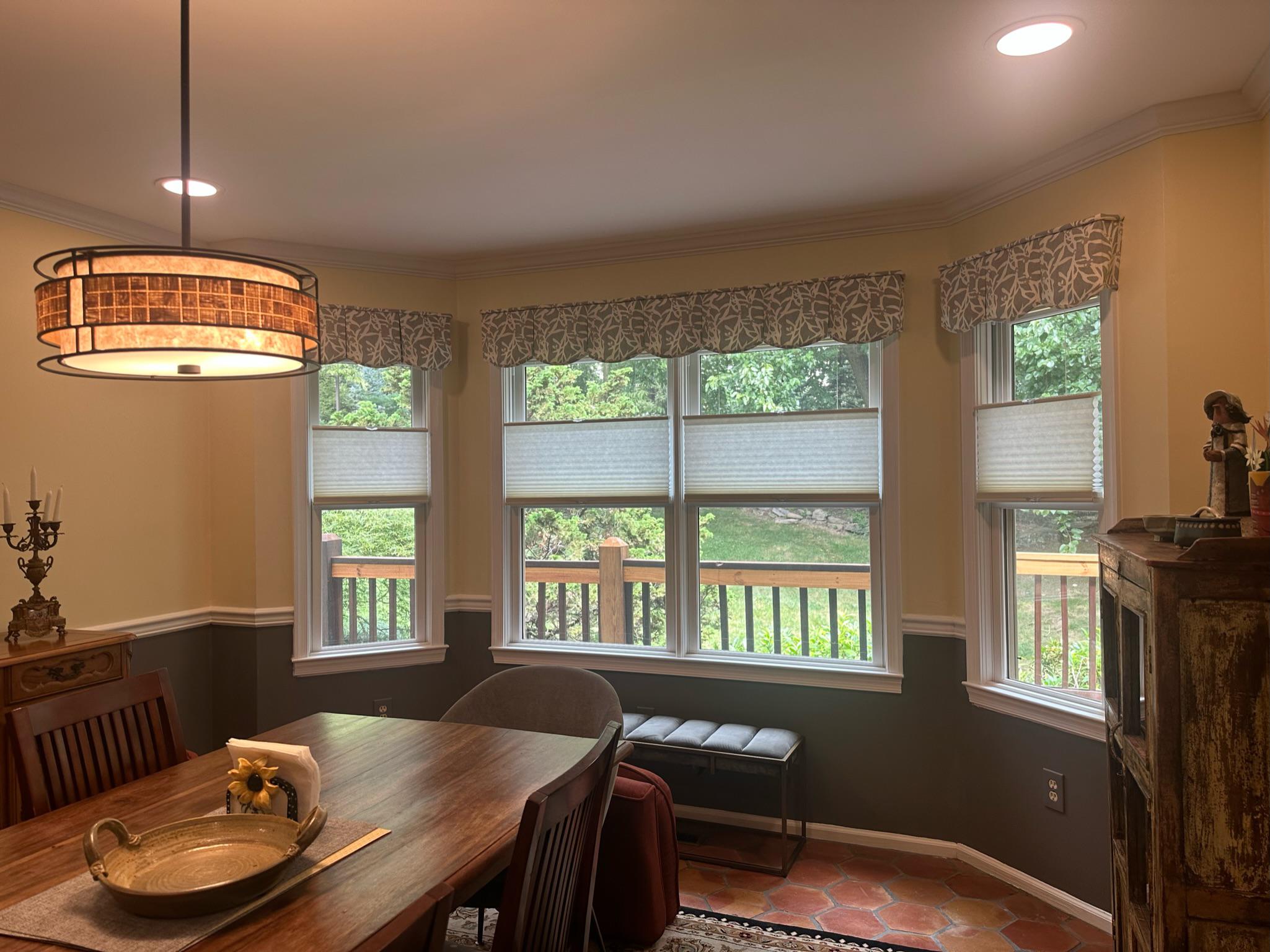 This King of Prussia, PA Dining Room was just updated with beautiful top-down bottom up light filtering cellular shades in Natural Sherpa and a board mounted valance in Origami Platinum.