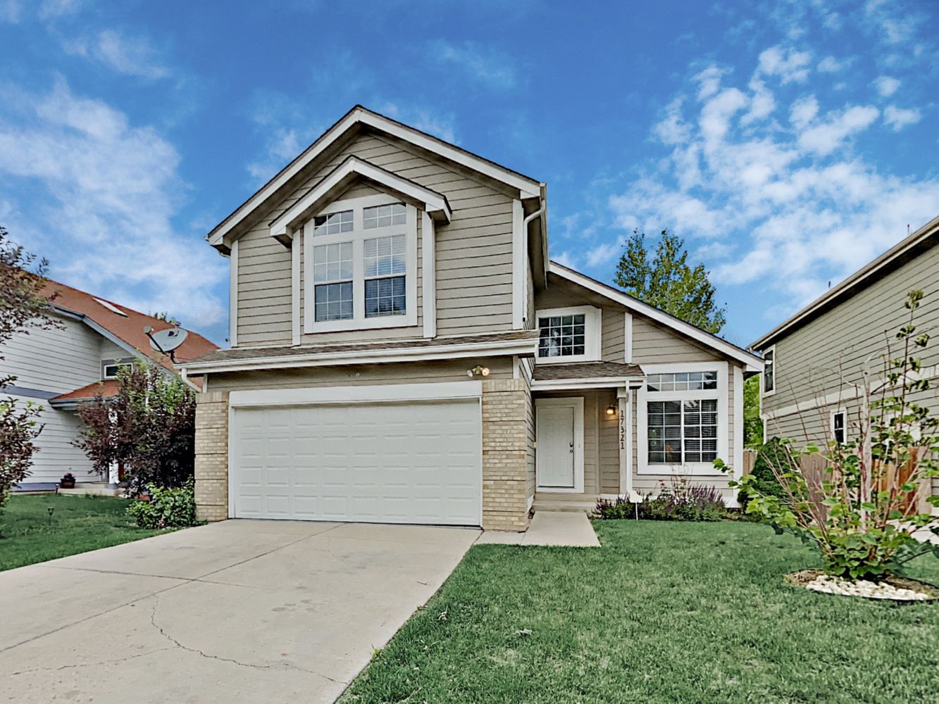 Modern home with two-care garage and lots of natural light at Invitation Homes in Denver.