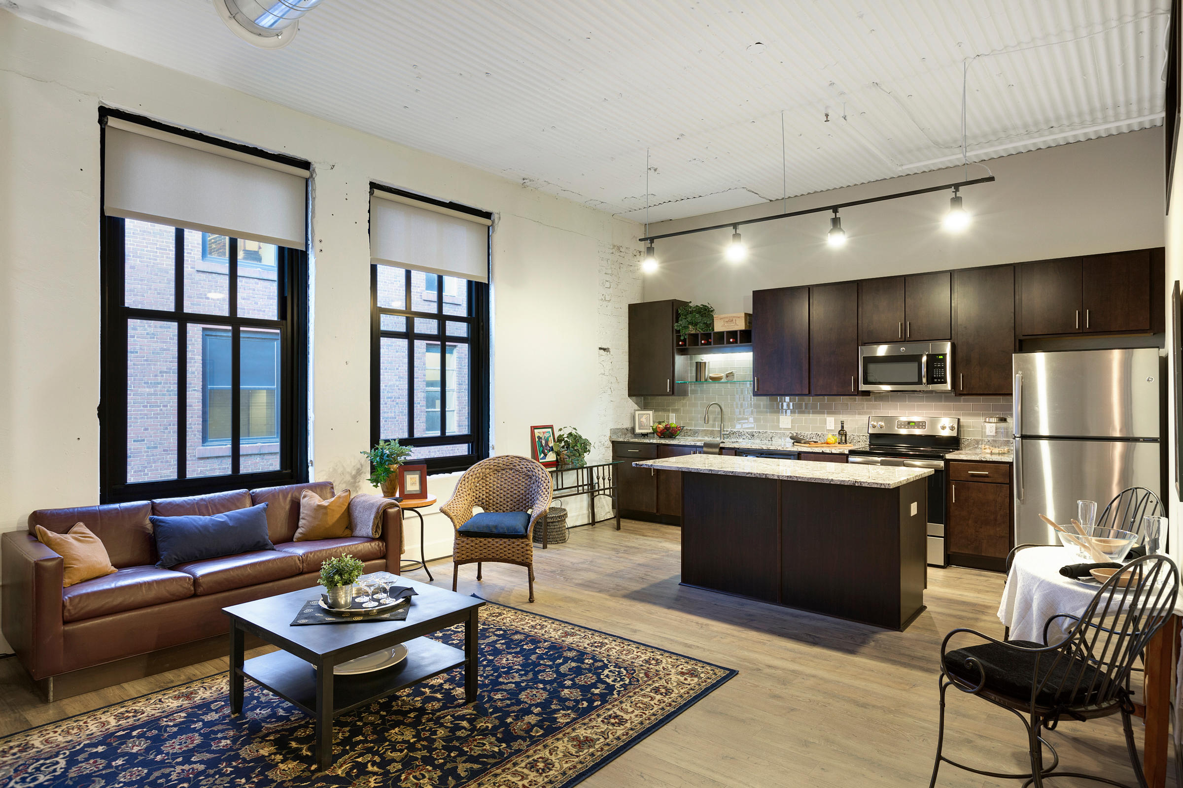 Open Concept Living Area With Large Windows