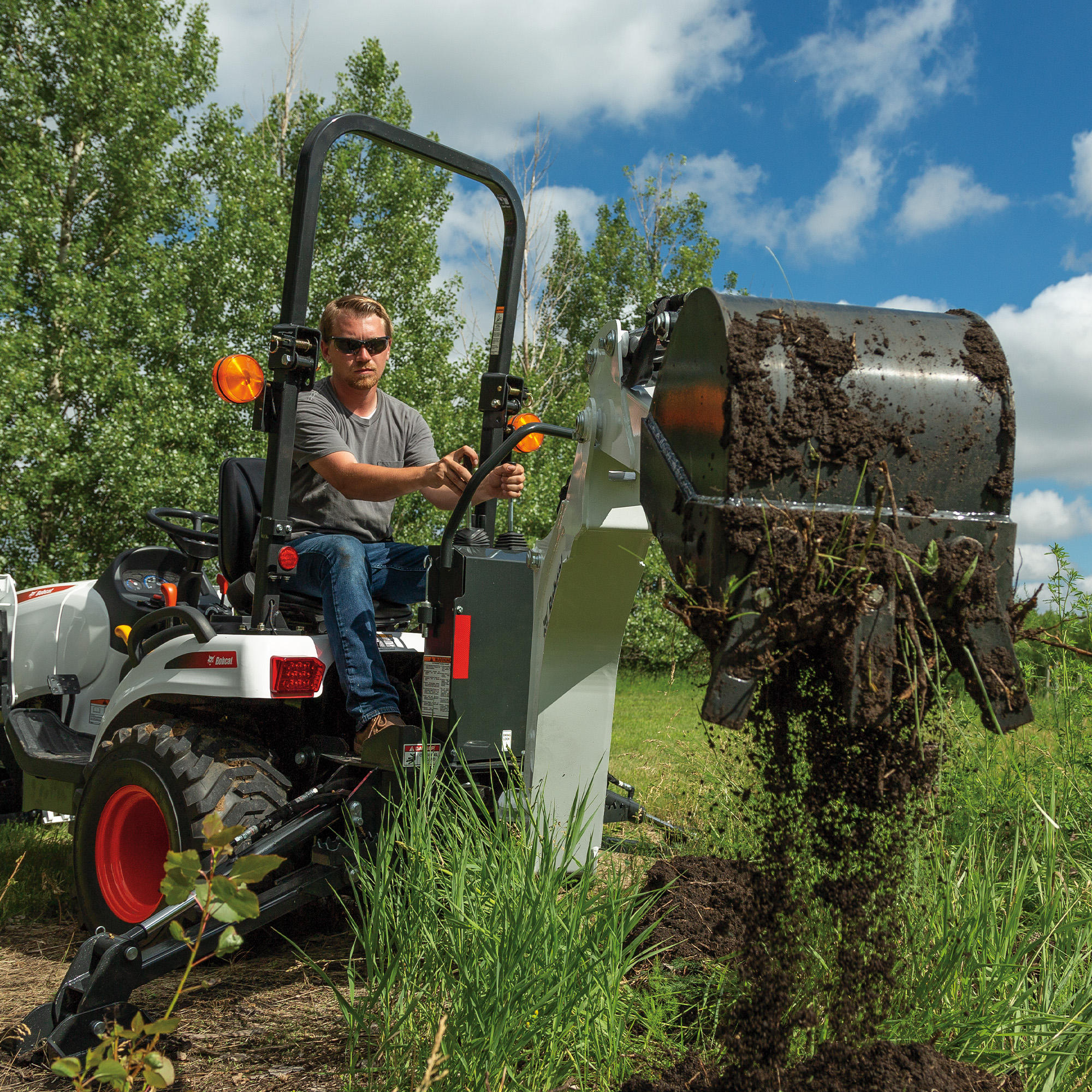 The Bobcat CT1021 compact tractor and backhoe implement