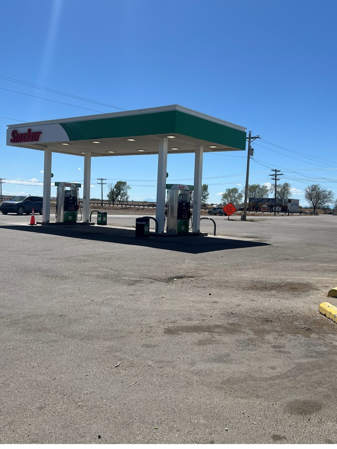 Sinclair gas station fueling island