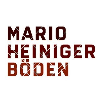 Heiniger Mario GmbH Logo