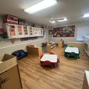 Bright and colorful preschool classroom at Childcare Network with age-appropriate learning materials