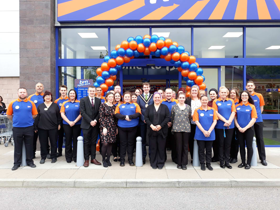 B&M's newest store team pose proudly outside the variety retailer's latest store, which opened in Culverhouse Cross, Cardiff on Wednesday.