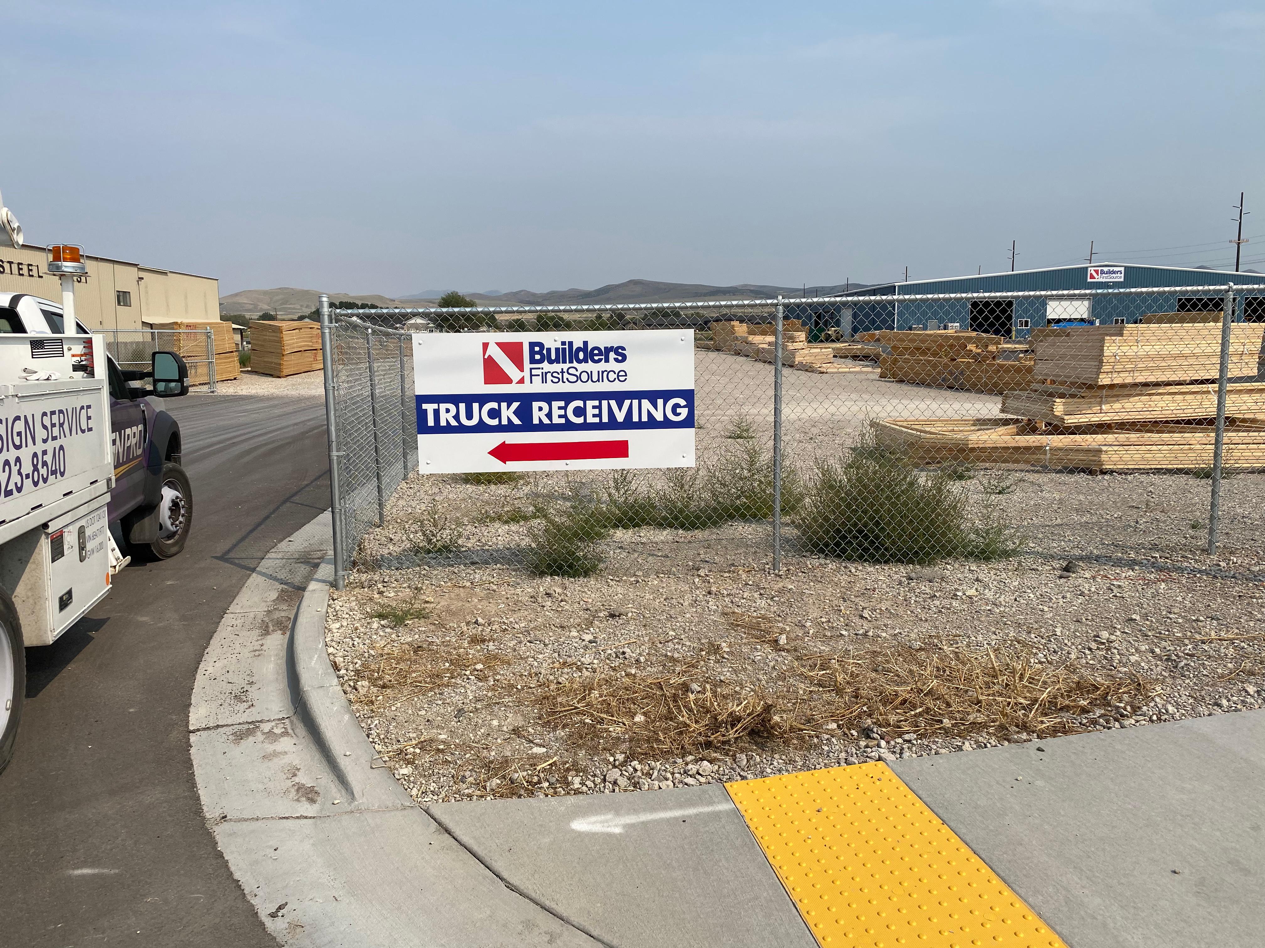 Truck Receiving Builders FirstSource Sign