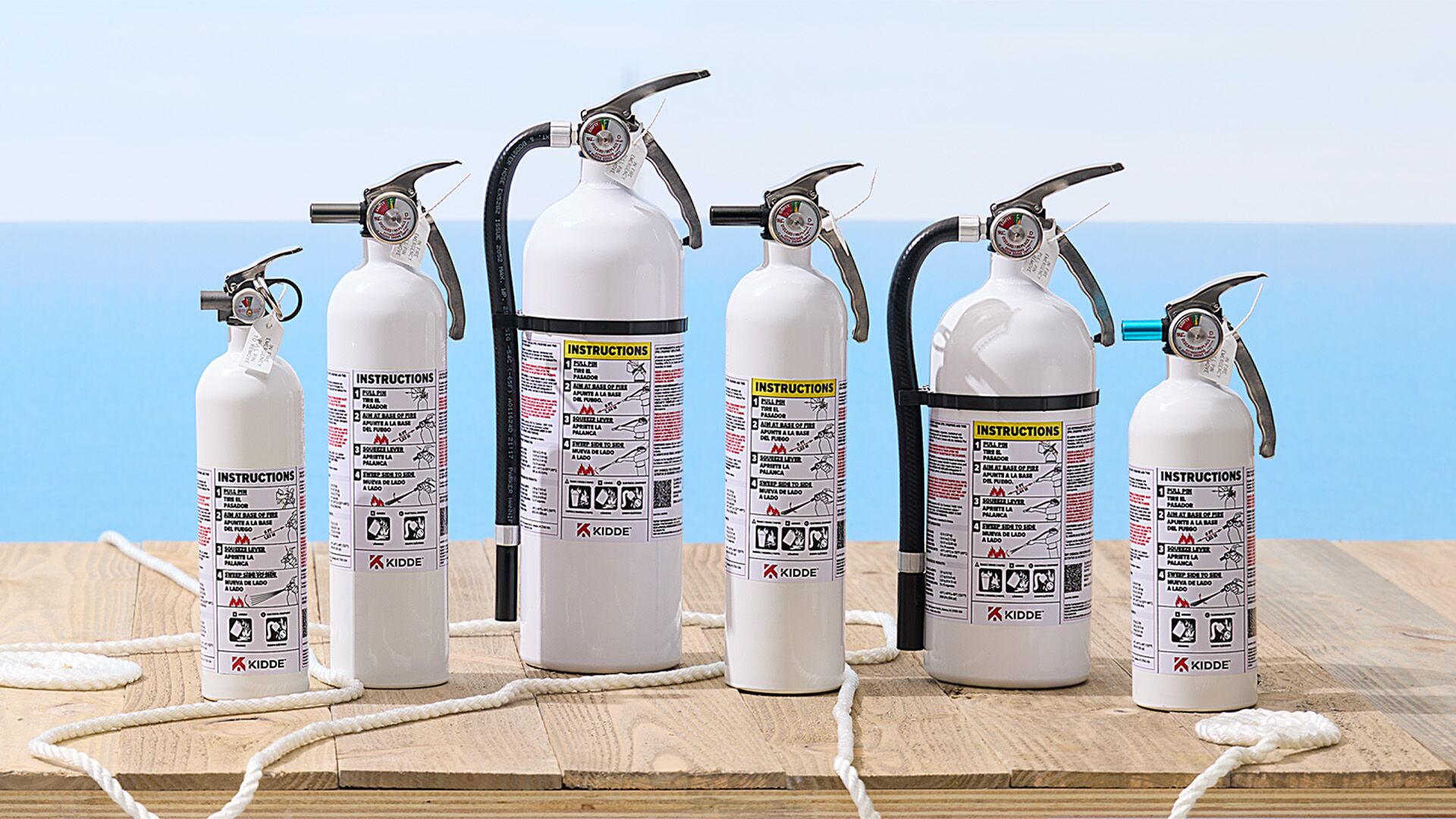 The full line of Kidde Marine fire extinguishers, available in several sizes.