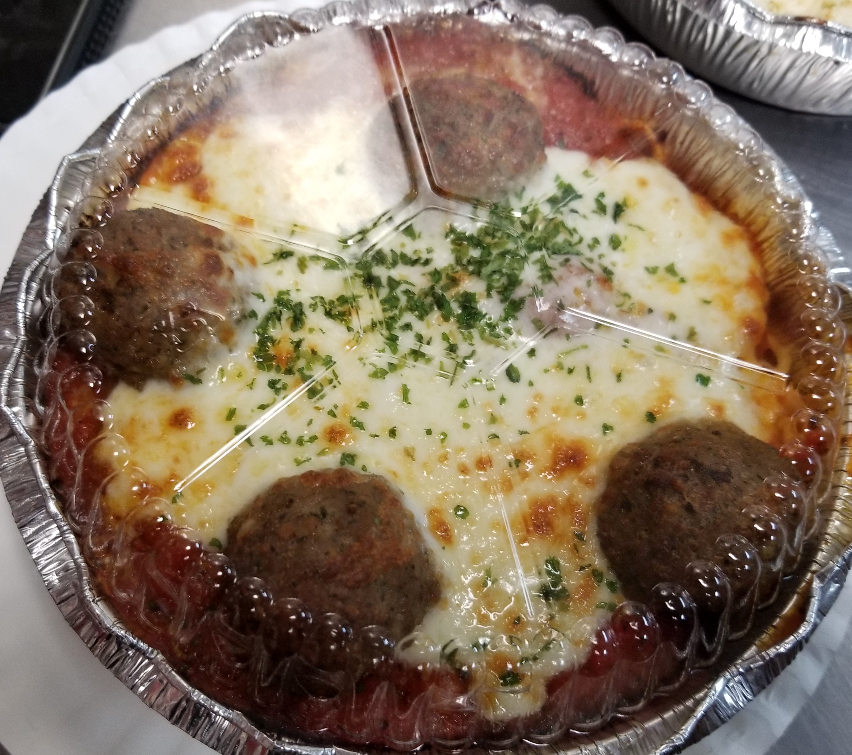 Keep it classic with our traditional Spaghetti and Meatballs pasta dinner smothered in mozzarella cheese! Also included is a fresh garlic bread stick and a crisp side salad!