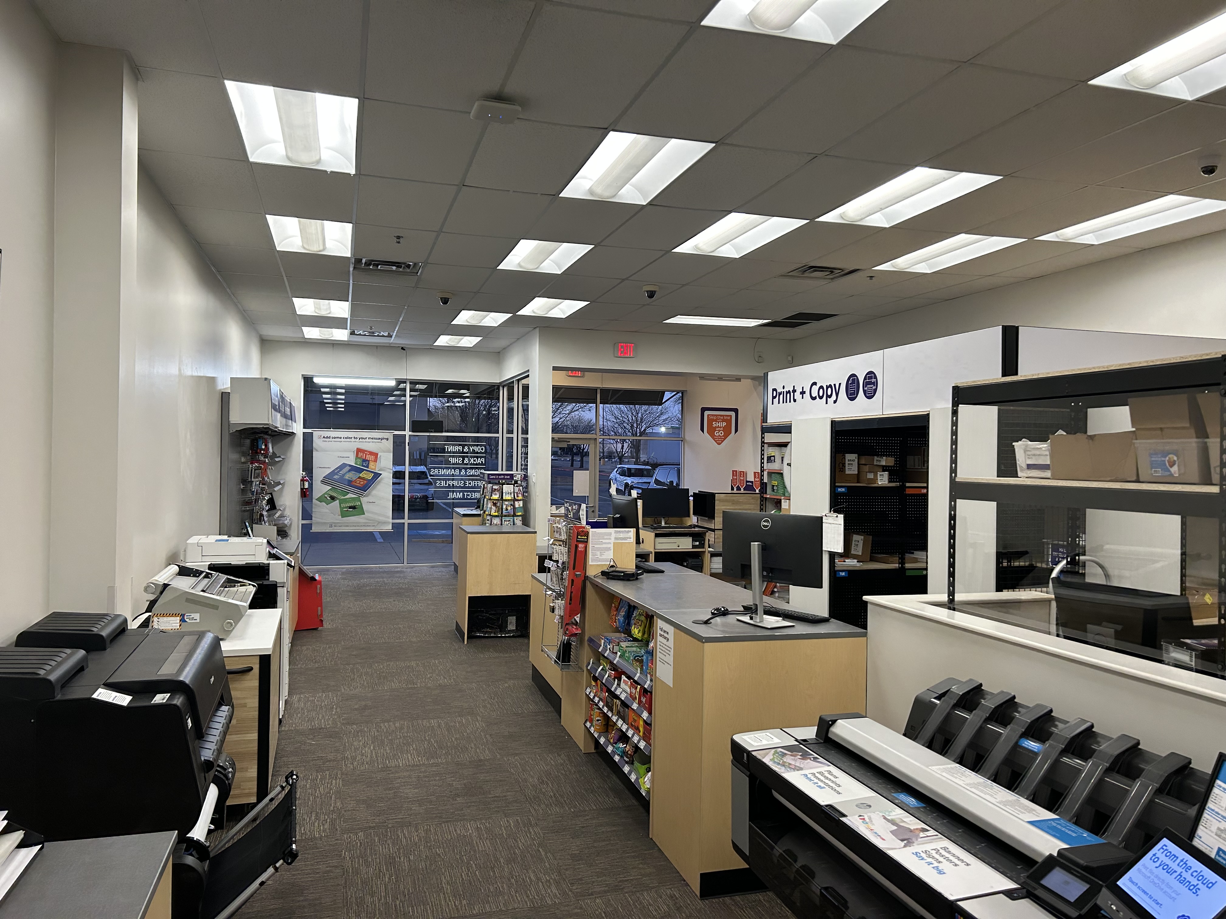 Print and Copy Services Area &ndash; Print and copy section with professional equipment at FedEx Office Burleson Texas supporting business and personal printing needs.