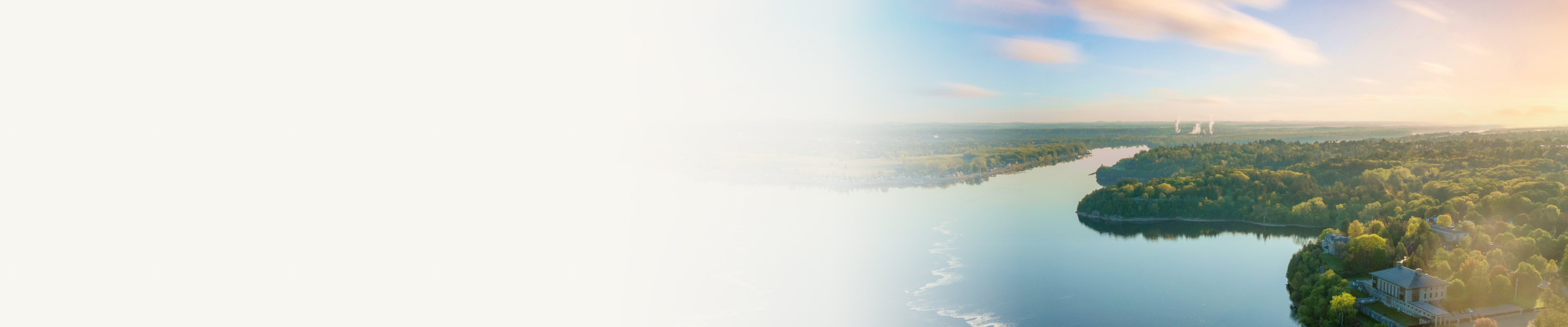 A beautiful, serene bird's eye view of a lake and surrounding forest.