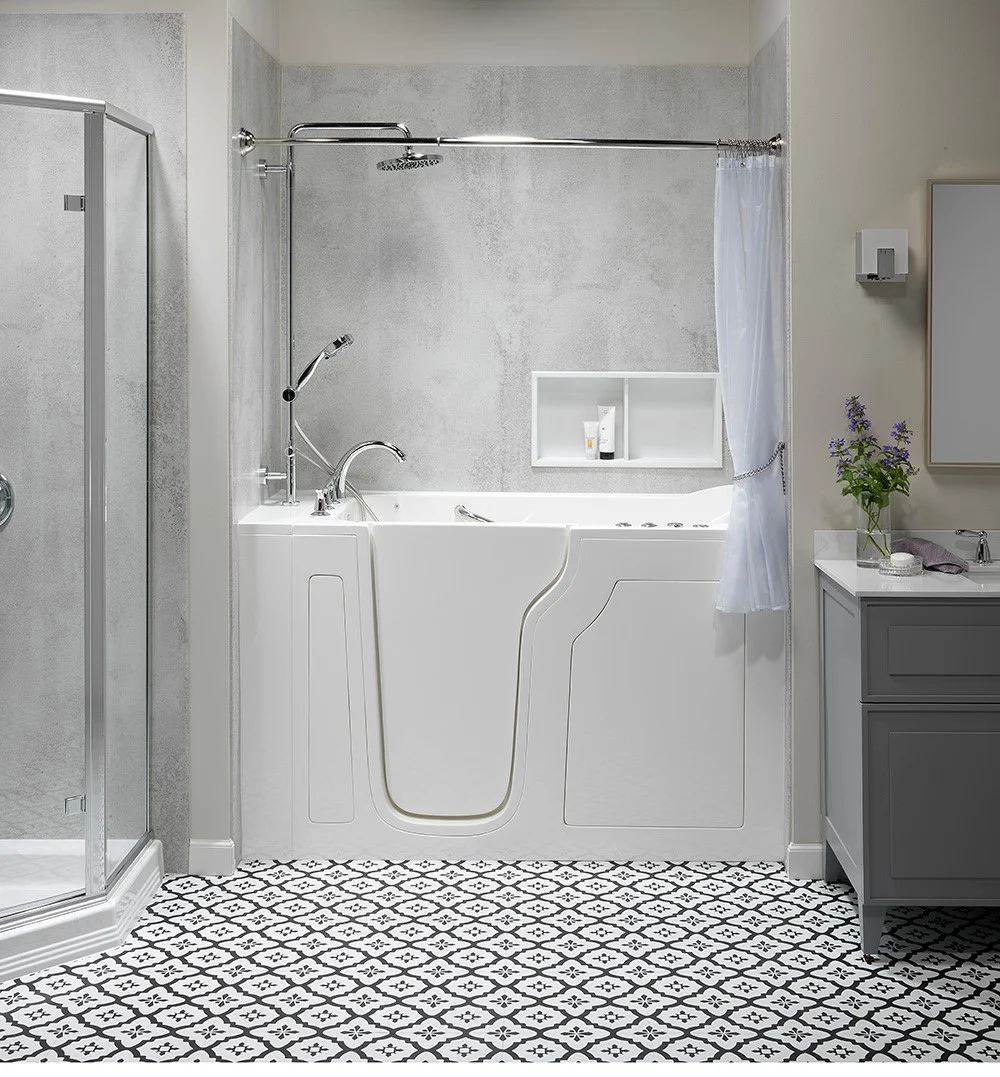 Accessible bathroom remodel by Luxury Bath featuring a walk-in tub, glass shower enclosure, and mode 