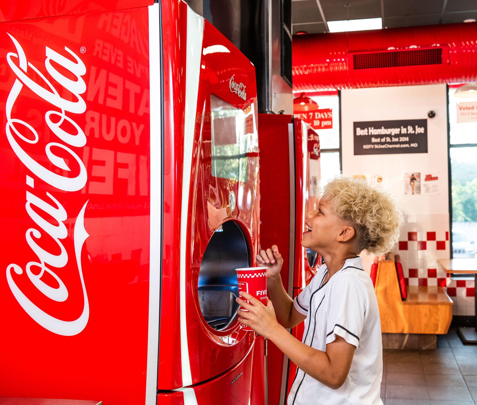 A child makes his drink selection at a Coca-Cola Freestyle machine inside a Five Guys restaurant. Five Guys Thousand Oaks (805)496-0173