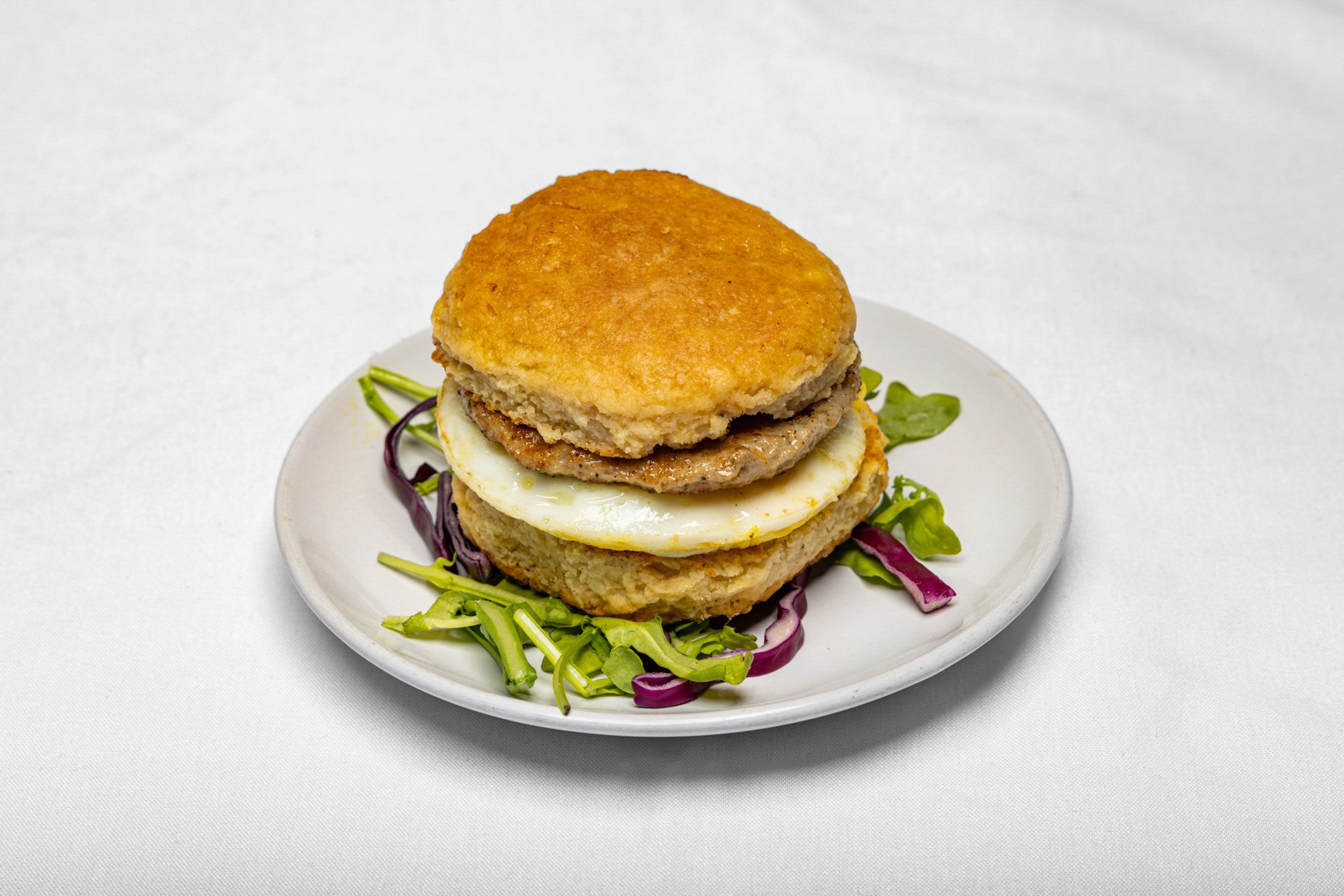Savory turkey sausage served with warm, buttery biscuits for a comforting classic.