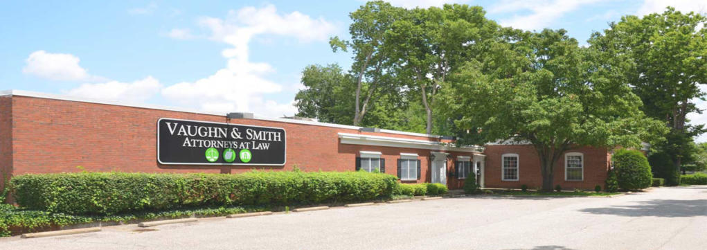 Vaughn & Smith is conveniently located in the heart of the St. Matthews neighborhood in Louisville, Kentucky.

Our building formerly served as St. Matthews City Hall, headquarters for the St. Matthews Police Department, the East End Branch of the Jefferson District Court, the Louisville offices of the Kentucky Court of Appeals and the Louisville offices of the Supreme Court of Kentucky.  The building retains a forty-foot interior mural depicting the history of St. Matthews and a vault that used to store the vital records of our St. Matthews neighbors.

Our building offers ample parking, three conference rooms and handicap accessibility.