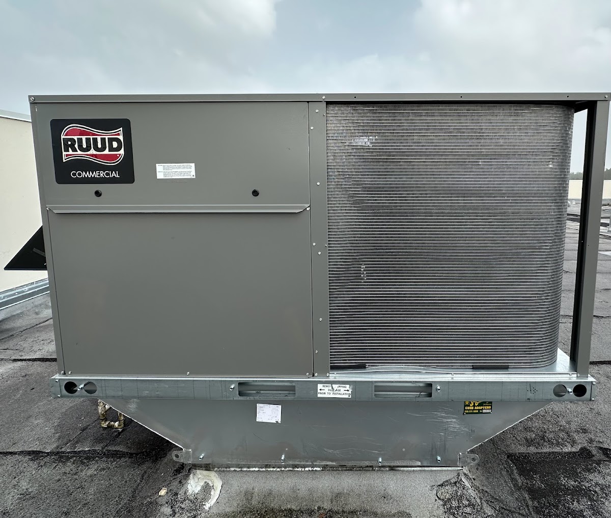 Commercial rooftop HVAC system installed with condenser coil access for dependable operation and maintenance.