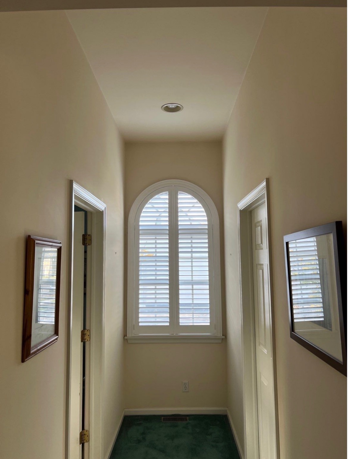 Custom interior shutters can be made to fit any window arch.